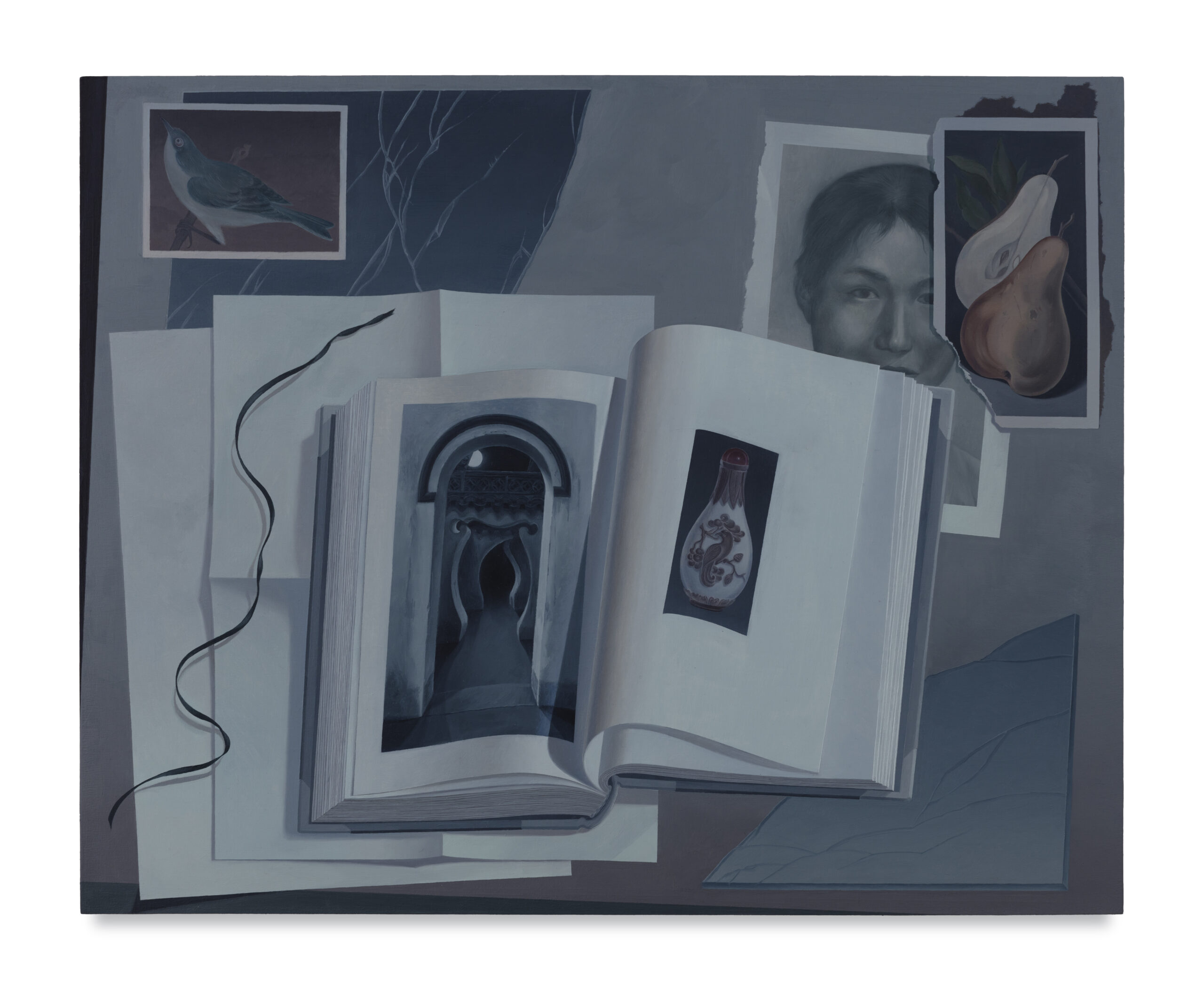 Painting with a book and photographs