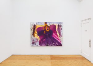 Exhibition view with a purple painting