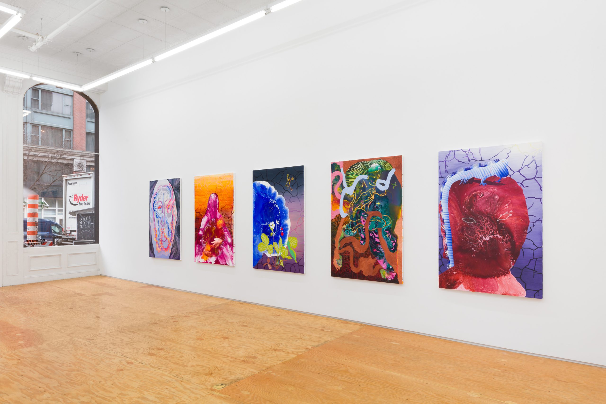 Exhibition view with paintings