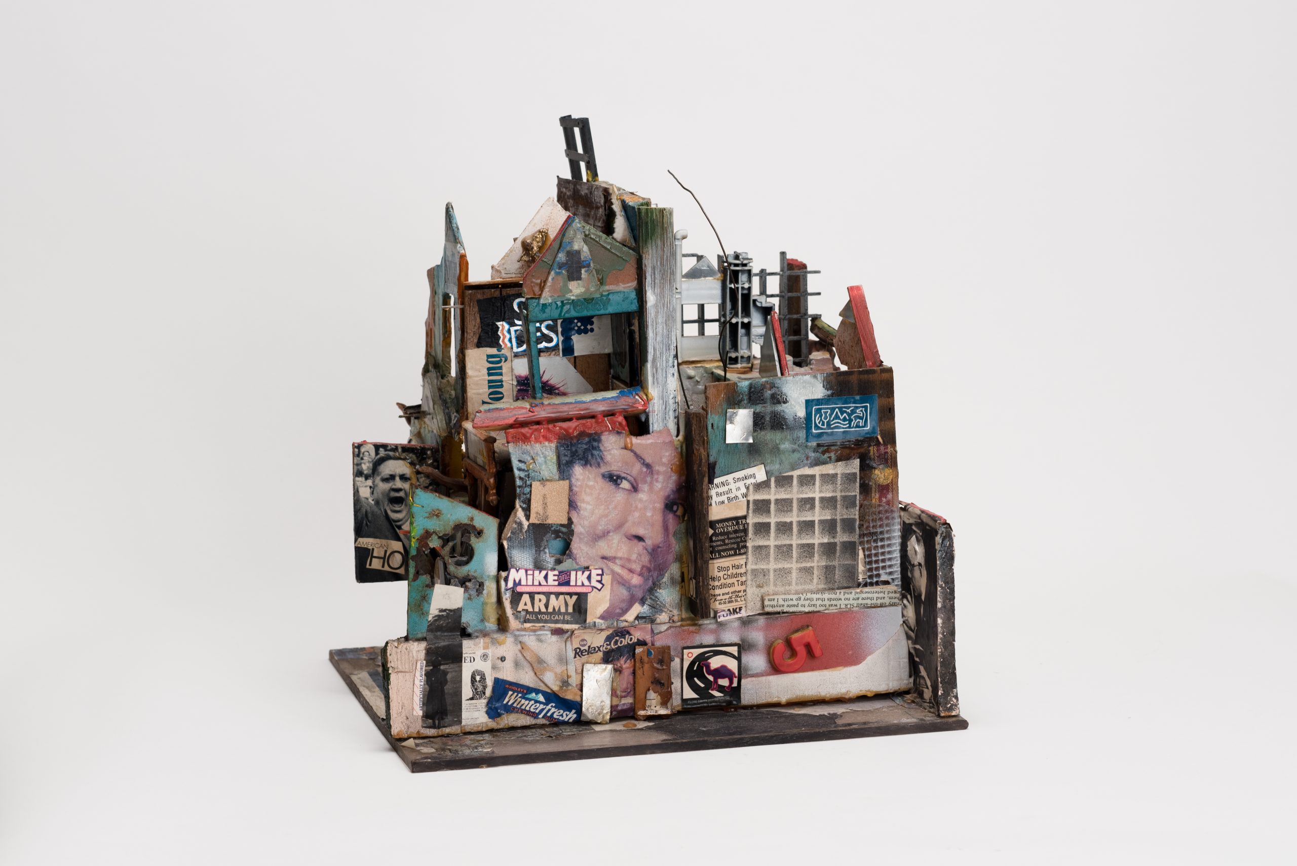 Collage, mixed media, found objects, sculpture small house by artist Leroy Johnson