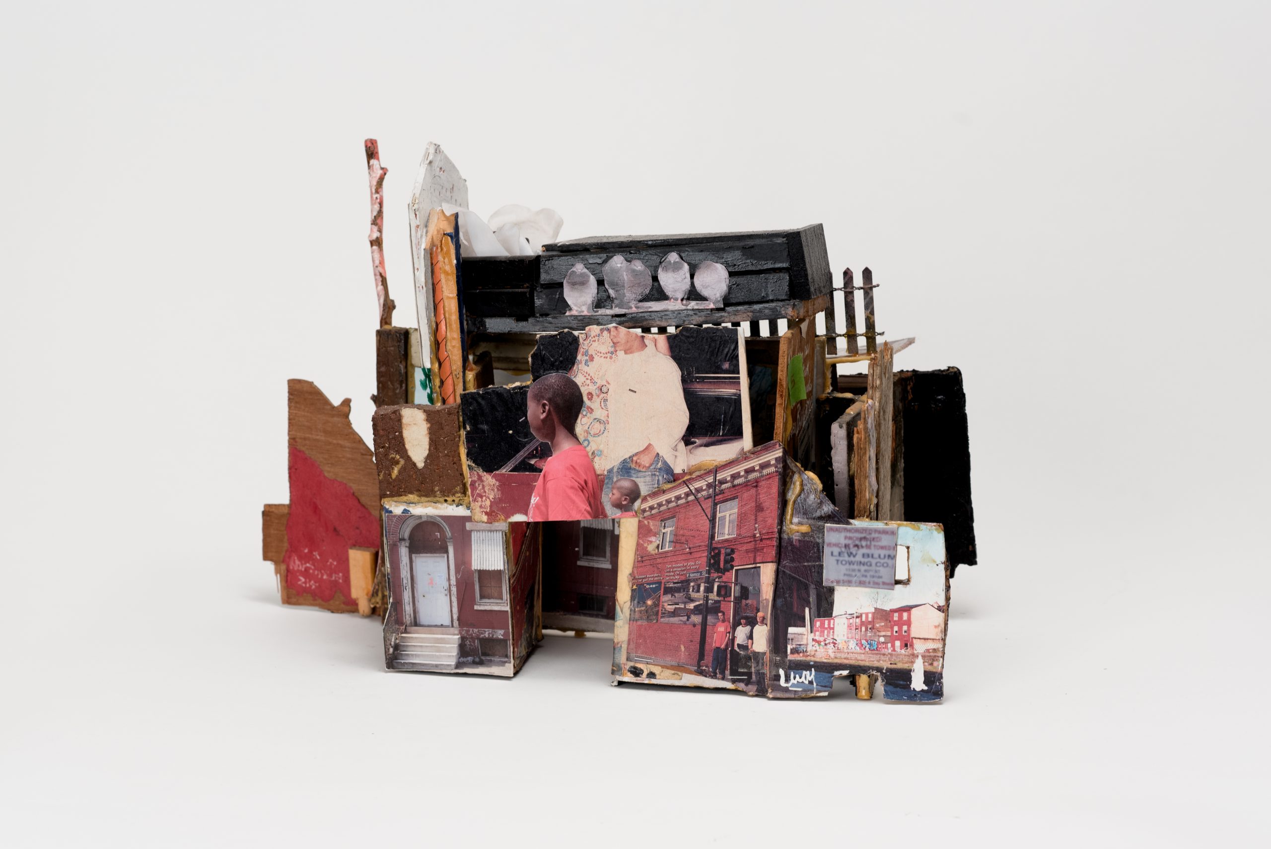 Collage, mixed media, found objects, sculpture small house by artist Leroy Johnson