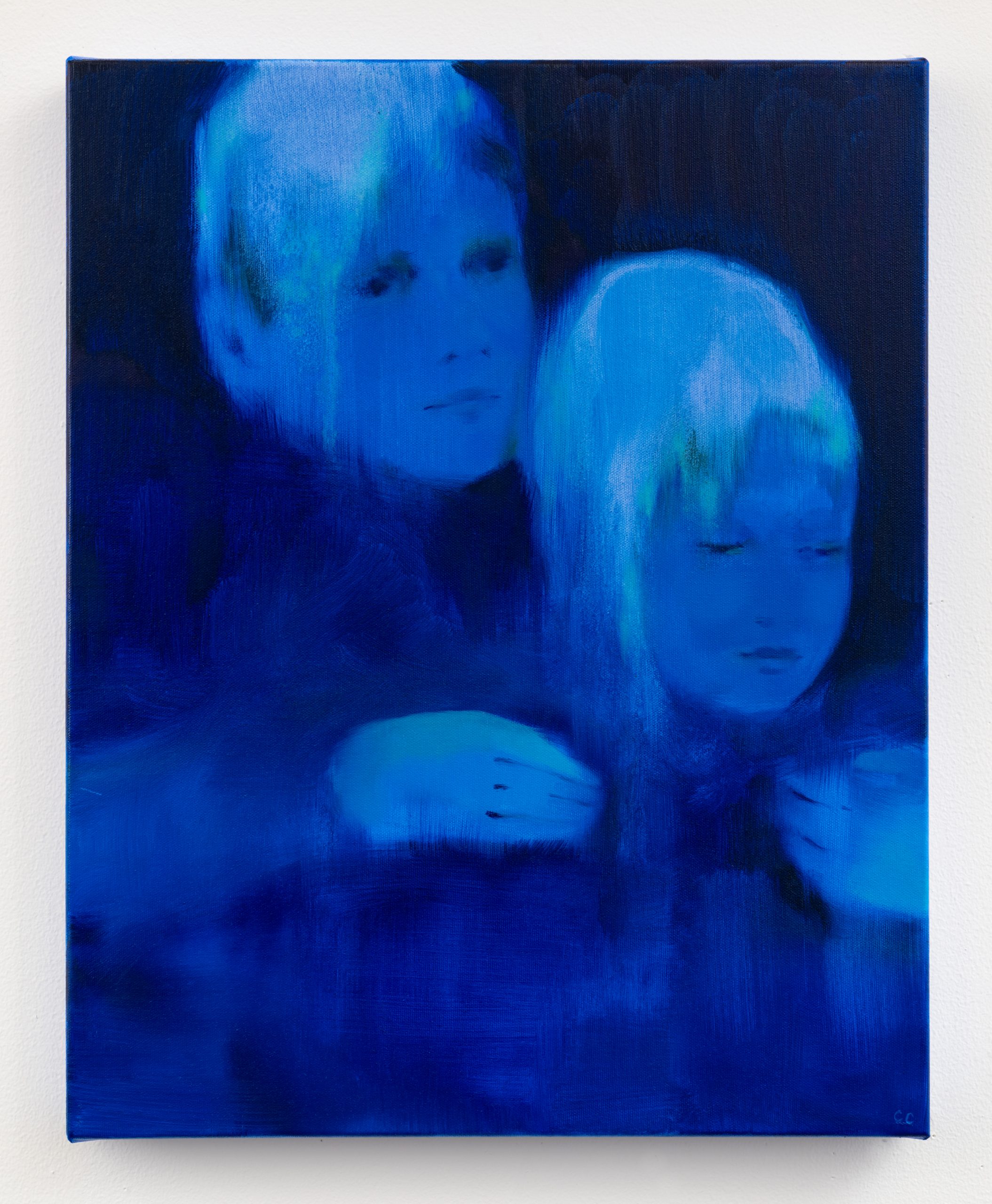 two figure in blue tones embrace