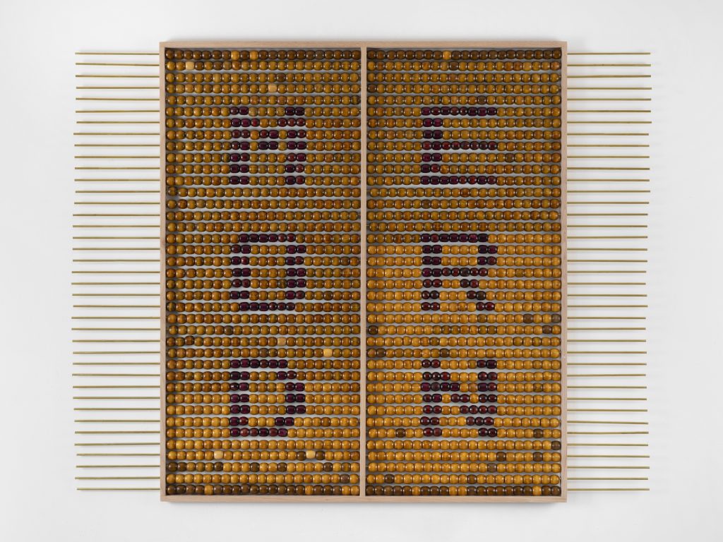 Brown beaded abacus with the words modern