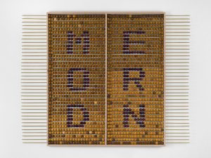 Brown beaded abacus with the words modern