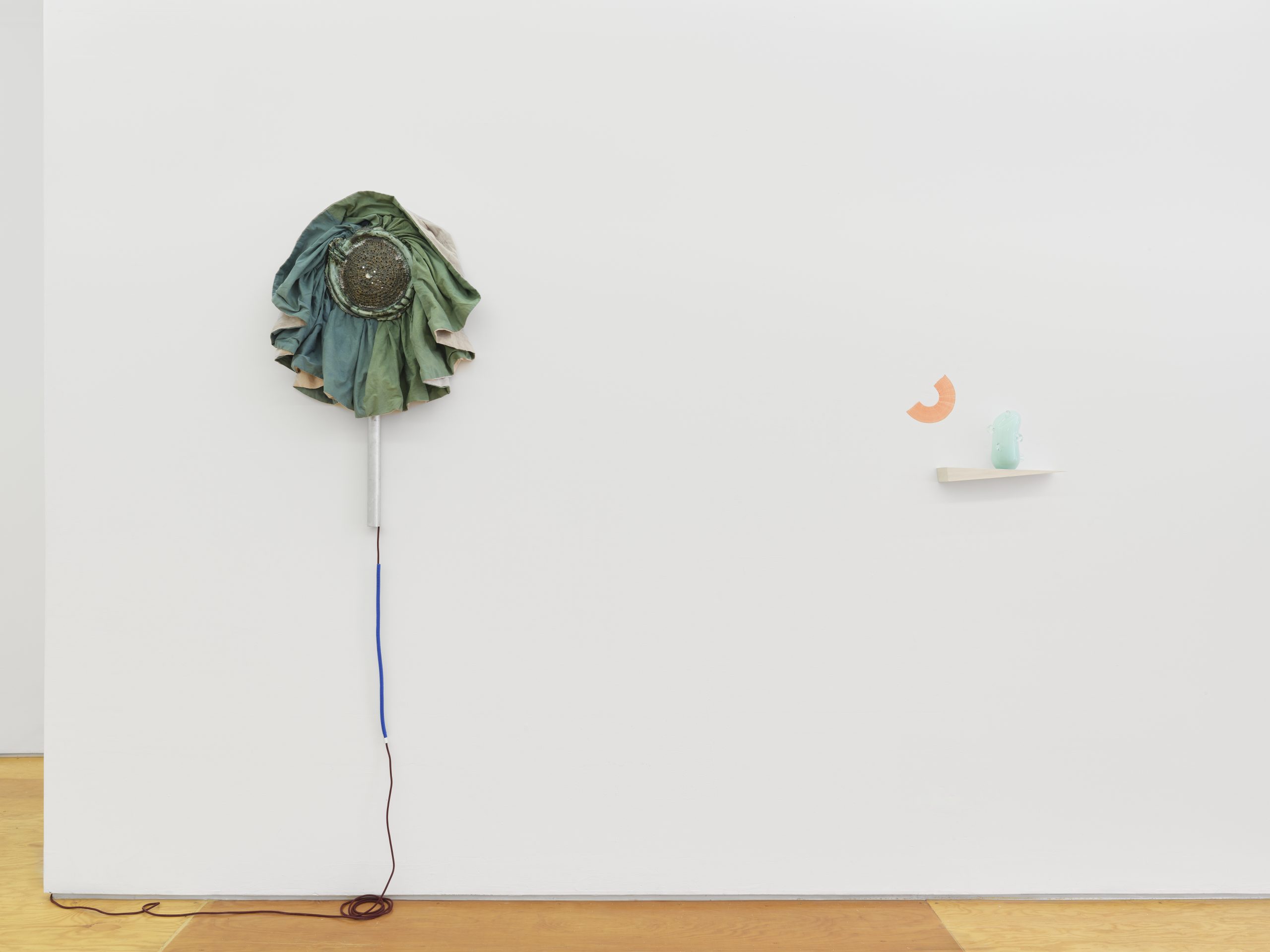 Installation view, Laura Aldridge at Margot Samel. Lamps and sculptures playful colors and range of materials, fabric, glass, wood, ceramic, stone.