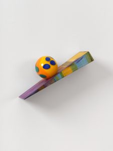 Colorful ramp with colorful spotted ball
